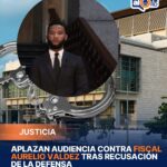 **Aplazan audiencia contra fiscal Aurelio Valdez tras recusación de la defensa** La audiencia para conocer la solicitud de prisión preventiva contra el fiscal Aurelio Valdez Alcántara fue aplazada sin nueva fecha, luego de que su defensa recusara a la jueza Isi Muñiz, alegando su participación previa en etapas del proceso de investigación. La decisión detiene temporalmente el avance del caso mientras la Suprema Corte de Justicia evalúa la recusación presentada. El titular de la Dirección de Persecución del Ministerio Público, Wilson Camacho, calificó la acción como un intento de retrasar el proceso judicial y defendió la solidez de las pruebas presentadas. El Ministerio Público mantiene su solicitud de prisión preventiva, alegando que el imputado habría estado vinculado a la recepción de dinero en una entrega controlada dentro de una investigación por presunta corrupción. Más información en alodigitalrd.com. #JusticiaRD #MinisterioPublico #CorrupcionRD #WilsonCamacho #AurelioValdez #PoderJudicialRD #AloRD #AloDigitalRD #NoticiasRD